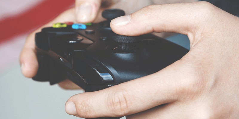 A Close-up view of a hand holding the gaming gear.