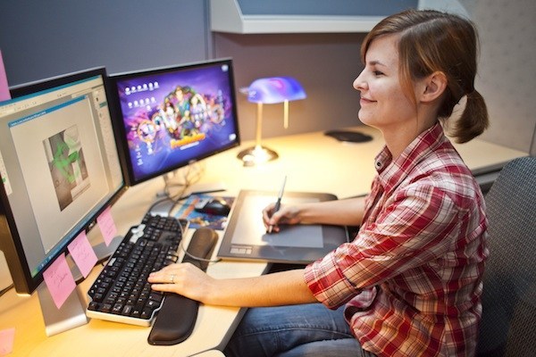 An Image Showing a woman developer denoting the codes.